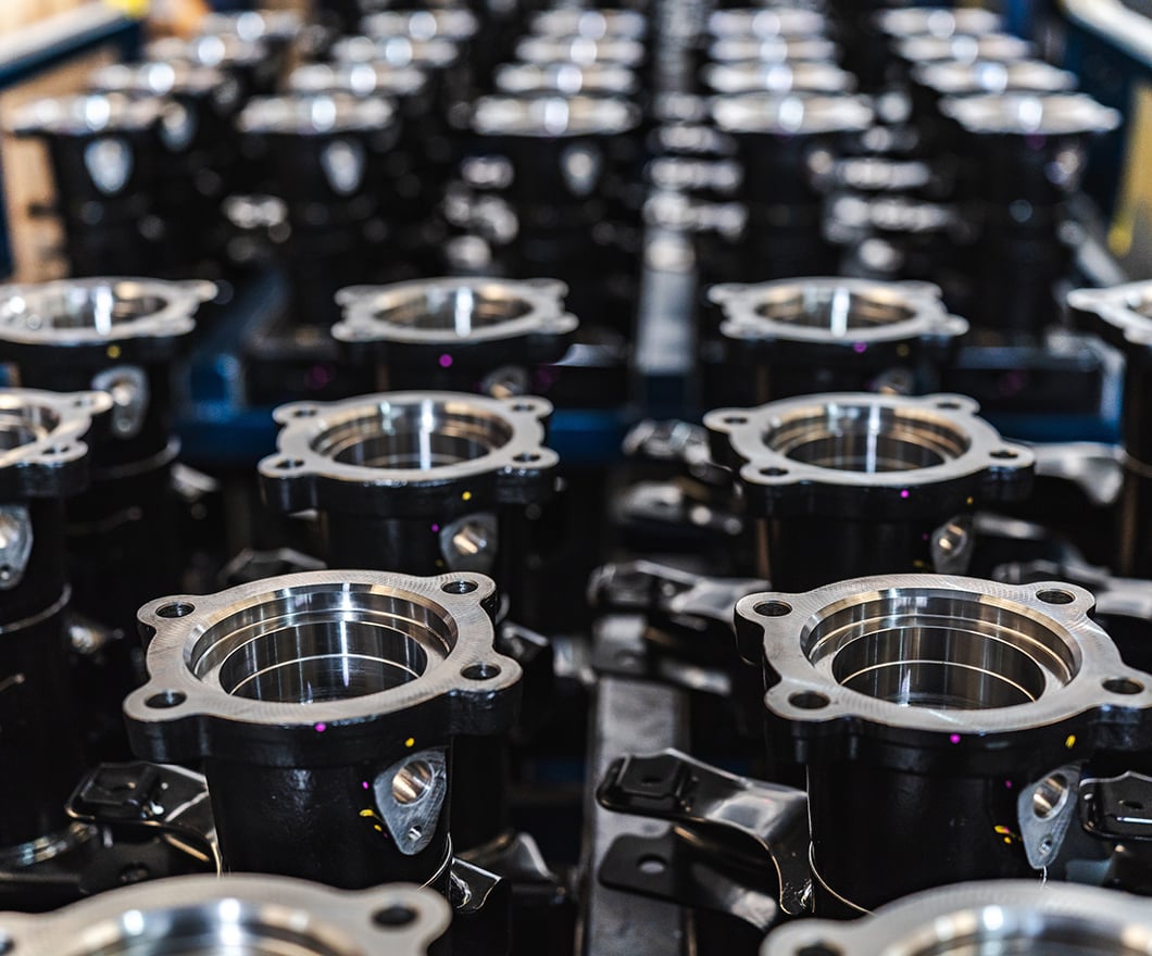rows-of-machined-metal-parts-factory-production