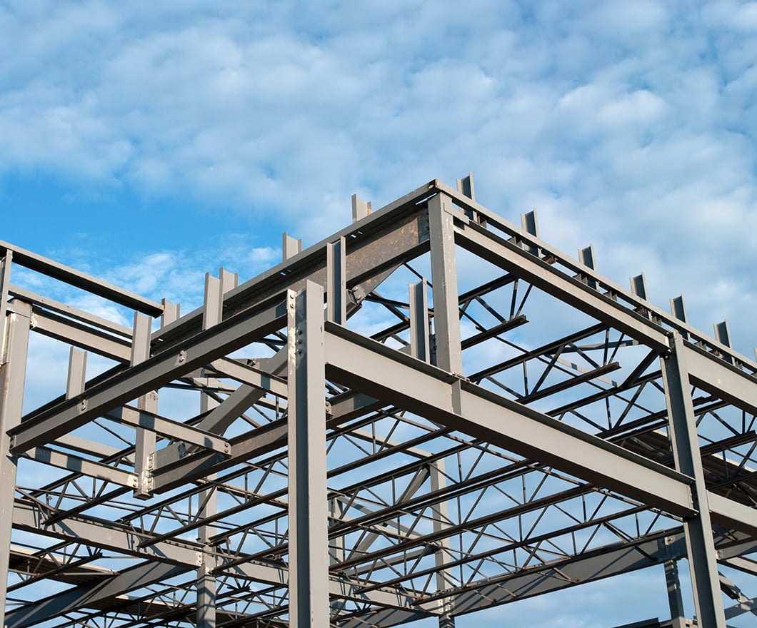steel-frame-building-construction-blue-sky
