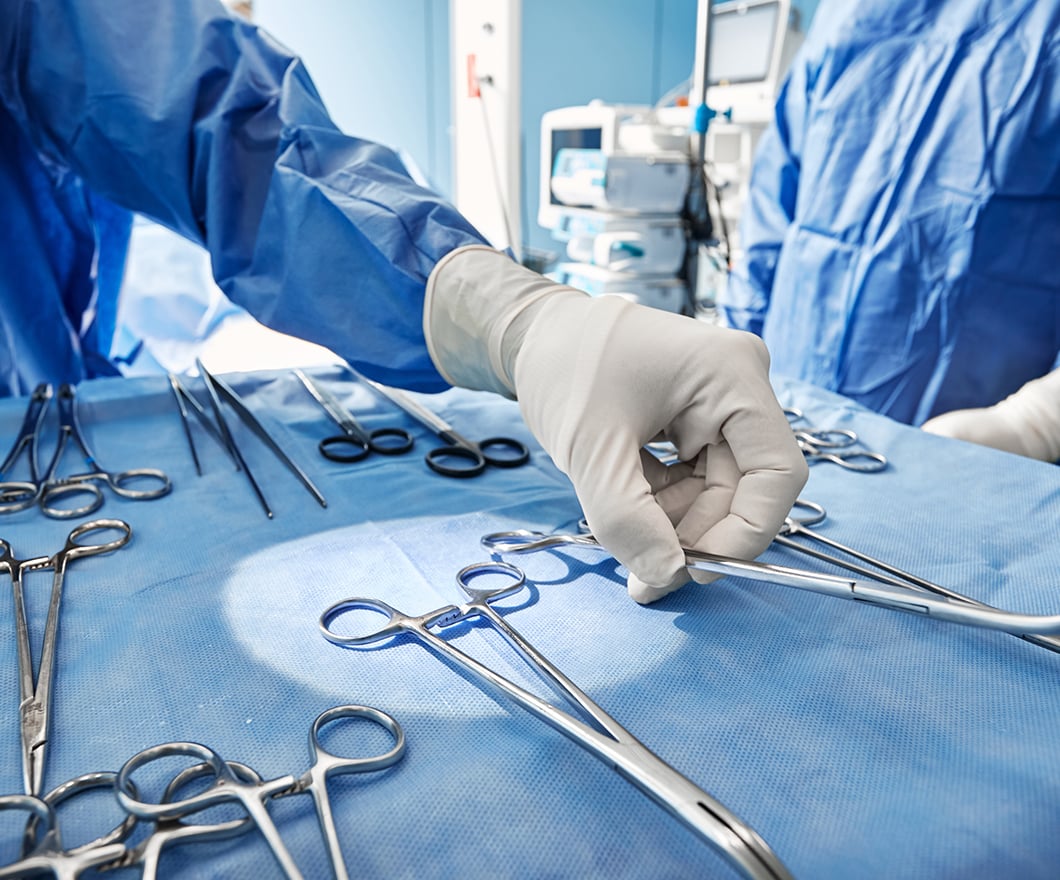 surgeon-hand-picking-surgical-instrument-operating-room